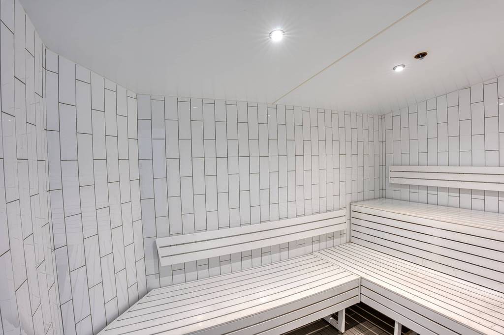 Steam room with timber bench seating