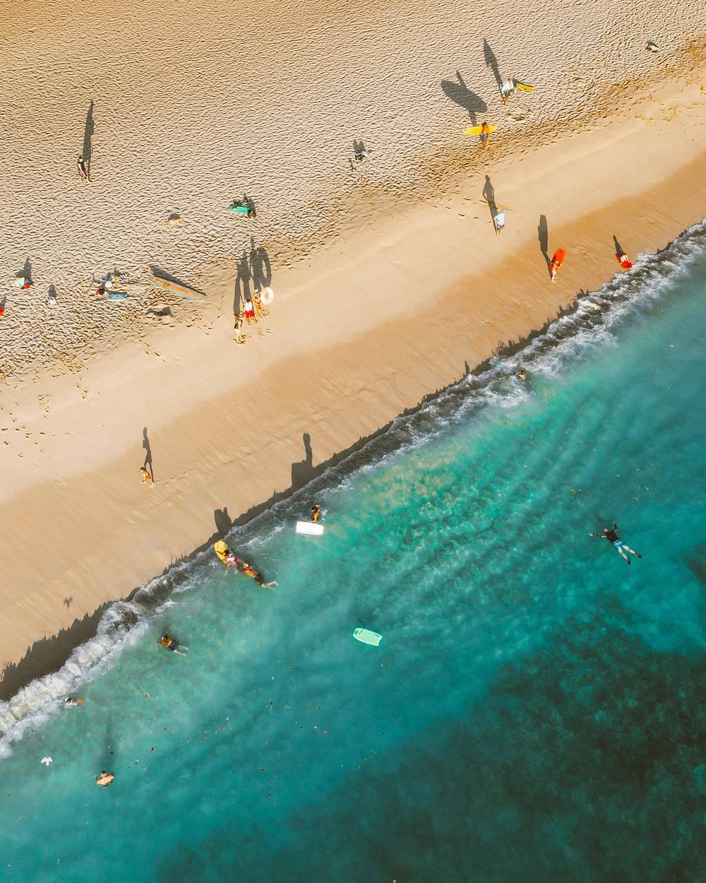 Open Pacific Ocean and patrolled Gold Coast sand under winter light