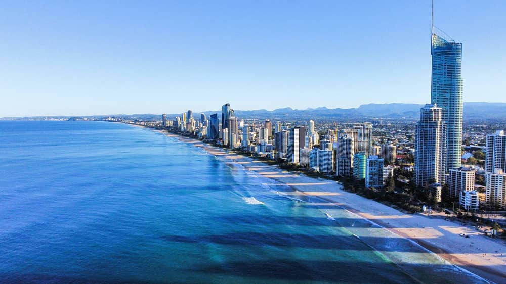 Aerial view of Gold Coast beachfront with high-rise towers and ocean