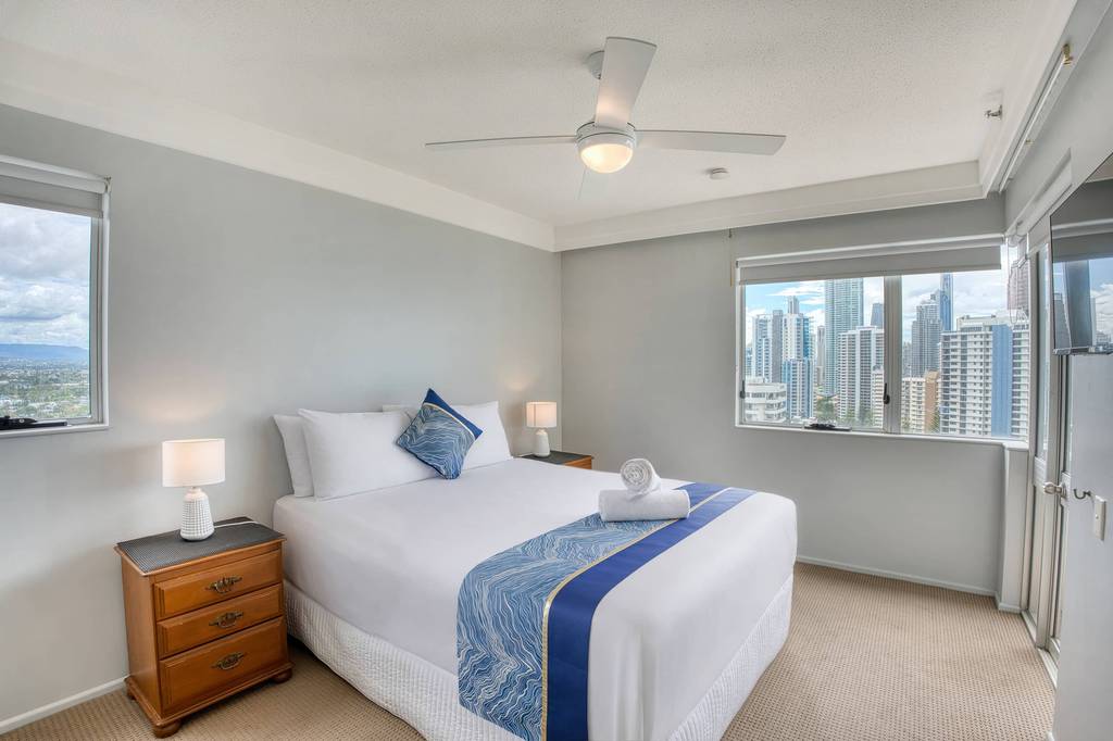 2 Bedroom Superior – bedroom with double bed and ocean views